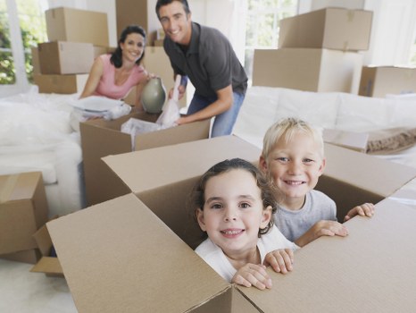 Furniture removals team handling household items in Enfield