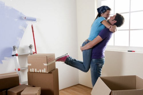 Protective wrapping and careful lifting equipment used for piano moving