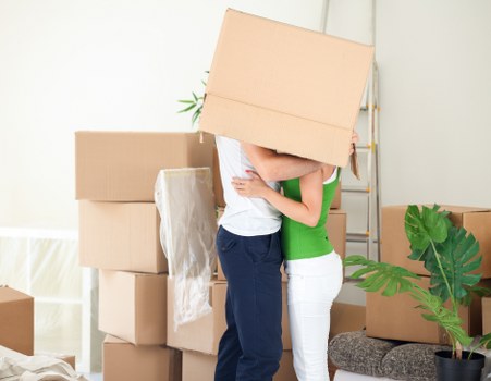 Packed office equipment and boxes ready for transport in Enfield