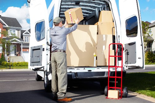 Removal team loading household items during an Enfield move