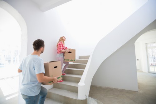 Assorted removal boxes and protective wrapping for Enfield moves