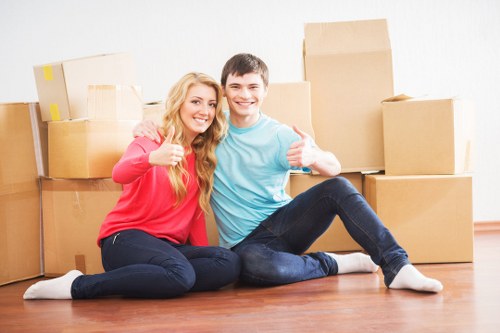 Local packing team preparing household items for relocation in Enfield