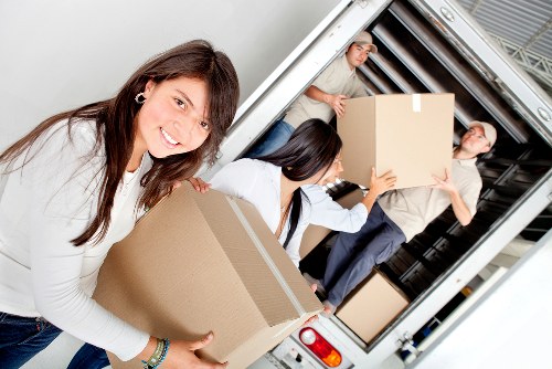 Packing and transporting office furniture during an Enfield relocation