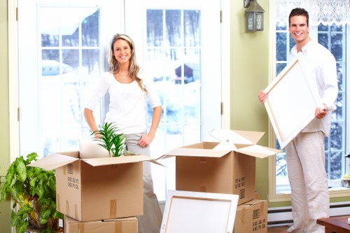 Household furniture being loaded for collection in Enfield