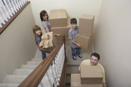 Mover carrying boxes for a local Enfield property job
